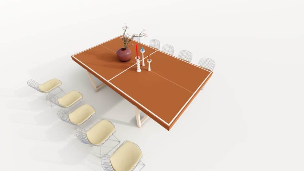 Table ping-pong design : Salle à manger moderne et minimaliste. Table de salle à manger ping-pong orange décorée (vase, bougeoirs). Neuf chaises Bertoia en fil d'acier et coussins jaunes.